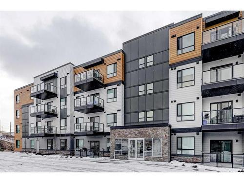 2109-42 Cranbrook Gardens Se, Calgary, AB - Outdoor With Balcony With Facade