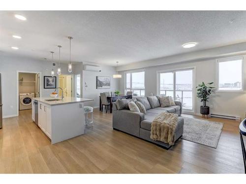 2109-42 Cranbrook Gardens Se, Calgary, AB - Indoor Photo Showing Living Room