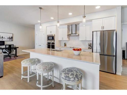 2109-42 Cranbrook Gardens Se, Calgary, AB - Indoor Photo Showing Kitchen With Stainless Steel Kitchen With Upgraded Kitchen