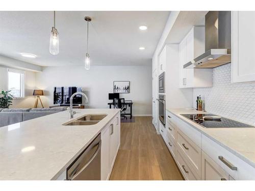 2109-42 Cranbrook Gardens Se, Calgary, AB - Indoor Photo Showing Kitchen With Stainless Steel Kitchen With Double Sink With Upgraded Kitchen