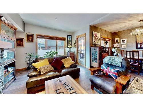 206-707 Spring Creek Drive Se, Canmore, AB - Indoor Photo Showing Living Room