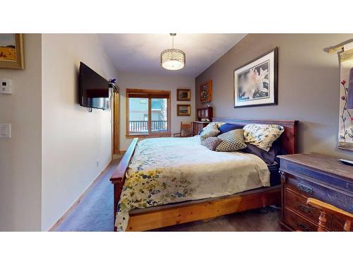 206-707 Spring Creek Drive Se, Canmore, AB - Indoor Photo Showing Bedroom