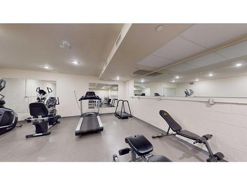 206-707 Spring Creek Drive Se, Canmore, AB - Indoor Photo Showing Gym Room