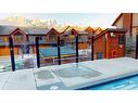 206-707 Spring Creek Drive Se, Canmore, AB  - Outdoor With Facade 