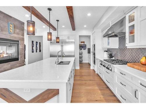 49 303 Avenue West, Rural Foothills County, AB - Indoor Photo Showing Kitchen With Double Sink With Upgraded Kitchen