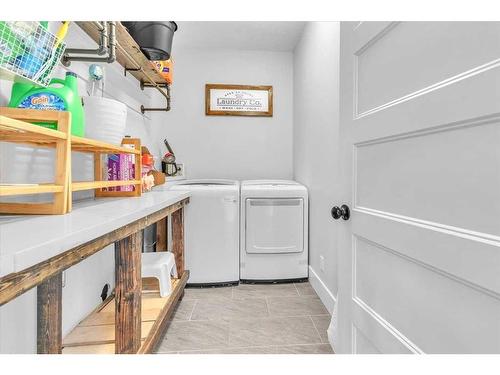 49 303 Avenue West, Rural Foothills County, AB - Indoor Photo Showing Laundry Room