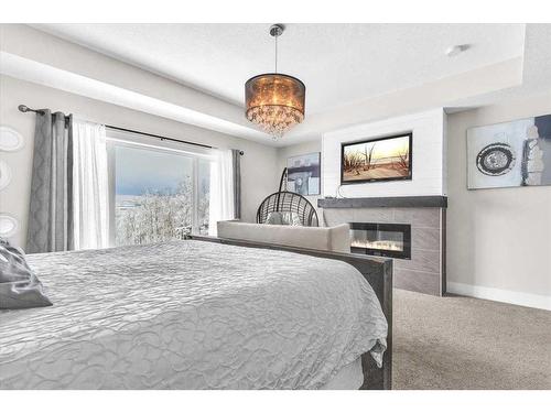 49 303 Avenue West, Rural Foothills County, AB - Indoor Photo Showing Bedroom