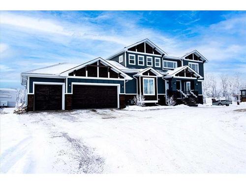 49 303 Avenue West, Rural Foothills County, AB - Outdoor With Facade