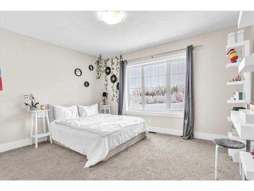 49 303 Avenue West, Rural Foothills County, AB - Indoor Photo Showing Bedroom