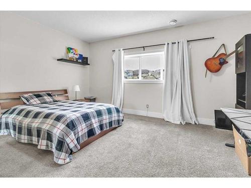 49 303 Avenue West, Rural Foothills County, AB - Indoor Photo Showing Bedroom