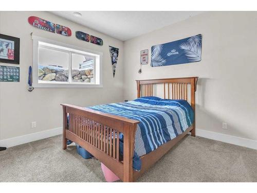 49 303 Avenue West, Rural Foothills County, AB - Indoor Photo Showing Bedroom