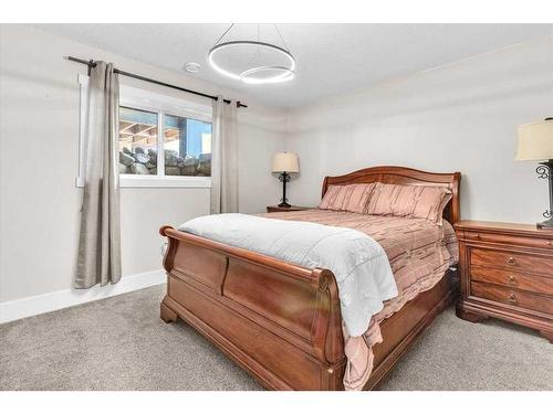 49 303 Avenue West, Rural Foothills County, AB - Indoor Photo Showing Bedroom