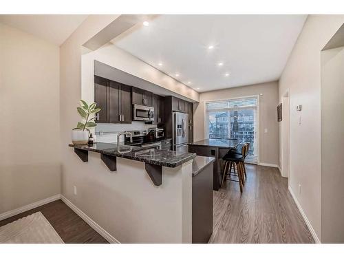 503-1086 Williamstown Boulevard Nw, Airdrie, AB - Indoor Photo Showing Kitchen