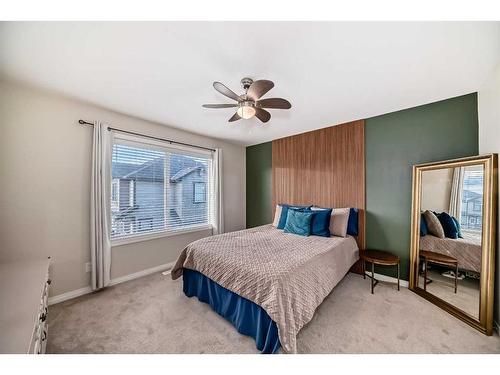 503-1086 Williamstown Boulevard Nw, Airdrie, AB - Indoor Photo Showing Bedroom