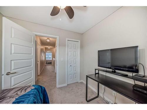 503-1086 Williamstown Boulevard Nw, Airdrie, AB - Indoor Photo Showing Bedroom