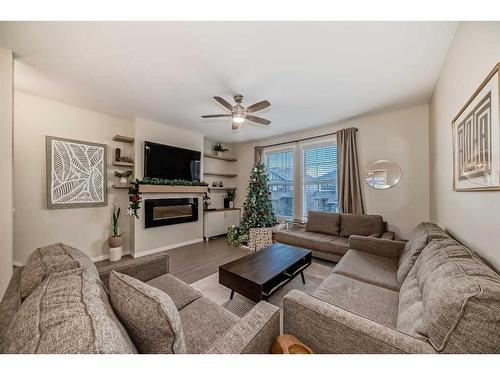 503-1086 Williamstown Boulevard Nw, Airdrie, AB - Indoor Photo Showing Living Room