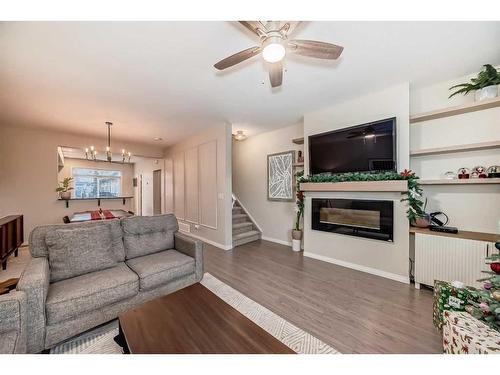 503-1086 Williamstown Boulevard Nw, Airdrie, AB - Indoor Photo Showing Living Room With Fireplace