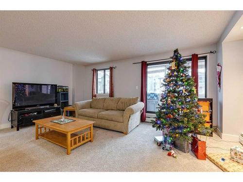 201-111 14 Avenue Se, Calgary, AB - Indoor Photo Showing Living Room