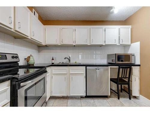 201-111 14 Avenue Se, Calgary, AB - Indoor Photo Showing Kitchen With Stainless Steel Kitchen