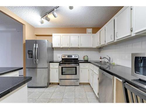 201-111 14 Avenue Se, Calgary, AB - Indoor Photo Showing Kitchen With Stainless Steel Kitchen