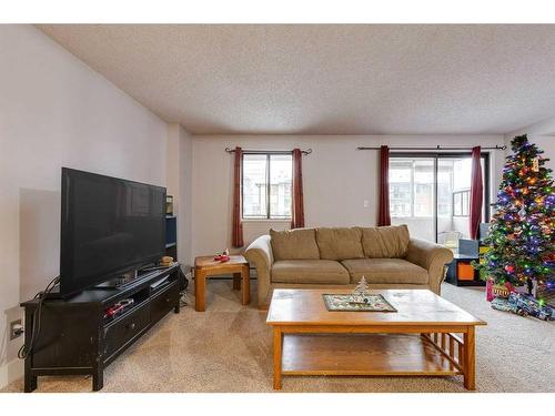 201-111 14 Avenue Se, Calgary, AB - Indoor Photo Showing Living Room