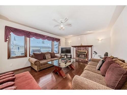 9 Edgevalley Way Nw, Calgary, AB - Indoor Photo Showing Living Room With Fireplace