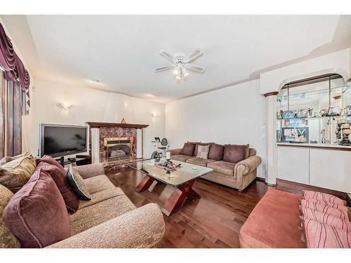 9 Edgevalley Way Nw, Calgary, AB - Indoor Photo Showing Living Room With Fireplace