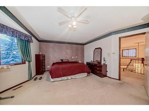 9 Edgevalley Way Nw, Calgary, AB - Indoor Photo Showing Bedroom