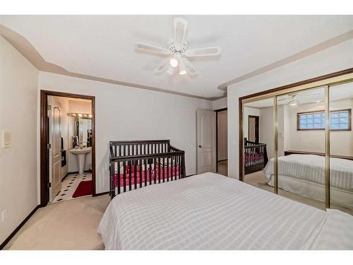 9 Edgevalley Way Nw, Calgary, AB - Indoor Photo Showing Bedroom