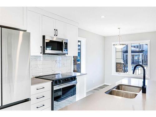 1362 148 Avenue Nw, Calgary, AB - Indoor Photo Showing Kitchen With Stainless Steel Kitchen With Double Sink With Upgraded Kitchen