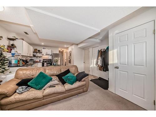 24 Erin Meadow Way Se, Calgary, AB - Indoor Photo Showing Living Room