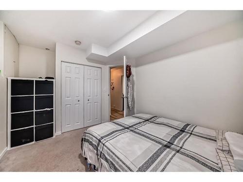 24 Erin Meadow Way Se, Calgary, AB - Indoor Photo Showing Bedroom