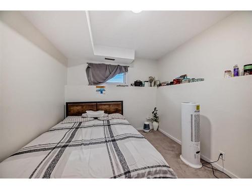 24 Erin Meadow Way Se, Calgary, AB - Indoor Photo Showing Bedroom