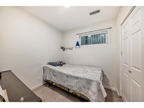 24 Erin Meadow Way Se, Calgary, AB - Indoor Photo Showing Bedroom