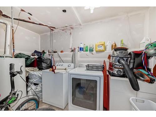 24 Erin Meadow Way Se, Calgary, AB - Indoor Photo Showing Laundry Room