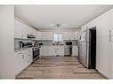 24 Erin Meadow Way Se, Calgary, AB  - Indoor Photo Showing Kitchen 