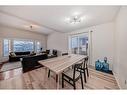 24 Erin Meadow Way Se, Calgary, AB  - Indoor Photo Showing Dining Room 