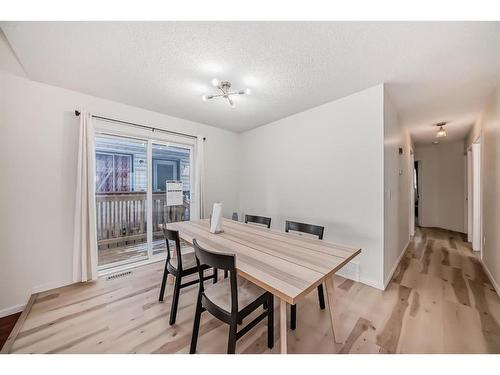 24 Erin Meadow Way Se, Calgary, AB - Indoor Photo Showing Dining Room