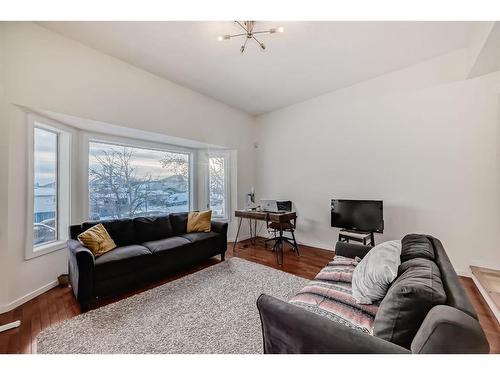 24 Erin Meadow Way Se, Calgary, AB - Indoor Photo Showing Living Room