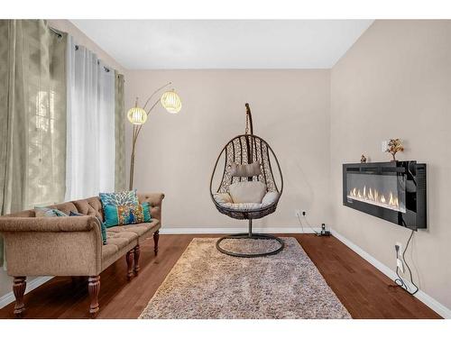 223 Skyview Point Road Ne, Calgary, AB - Indoor Photo Showing Living Room With Fireplace