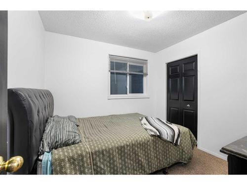 193 Taradale Drive Ne, Calgary, AB - Indoor Photo Showing Bedroom