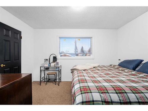 193 Taradale Drive Ne, Calgary, AB - Indoor Photo Showing Bedroom