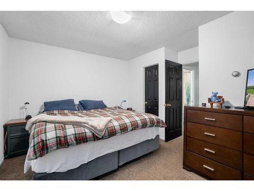 193 Taradale Drive Ne, Calgary, AB - Indoor Photo Showing Bedroom