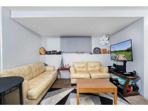 193 Taradale Drive Ne, Calgary, AB - Indoor Photo Showing Living Room