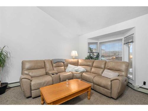 193 Taradale Drive Ne, Calgary, AB - Indoor Photo Showing Living Room