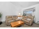 193 Taradale Drive Ne, Calgary, AB  - Indoor Photo Showing Living Room 