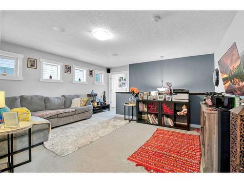 5 Silverado Creek Crescent Sw, Calgary, AB - Indoor Photo Showing Living Room