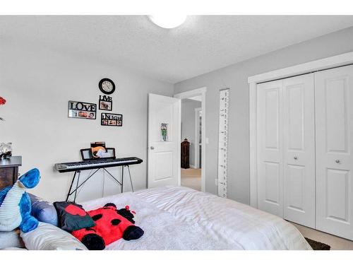 5 Silverado Creek Crescent Sw, Calgary, AB - Indoor Photo Showing Bedroom