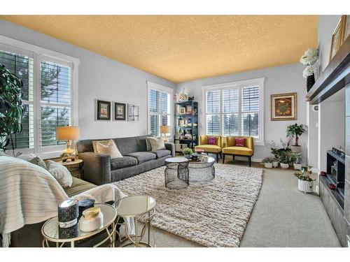 5 Silverado Creek Crescent Sw, Calgary, AB - Indoor Photo Showing Living Room