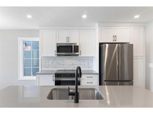 257 Yorkville Boulevard Sw, Calgary, AB - Indoor Photo Showing Kitchen With Stainless Steel Kitchen With Upgraded Kitchen